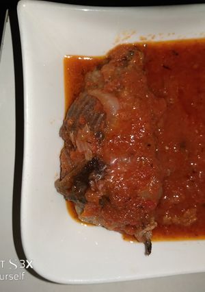 A picture of Cat fish in sauce.