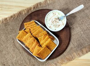Una foto de 🧀Crackers de calabaza, queso y harina de garbanzo 🧀