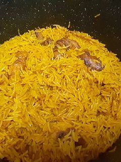 صورة لوصفة كبسة بالفراخ والسكر المكرمل