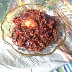 Lal shak ar amda (red amaranth with hog plum or wild mango) A picture of Lal shak ar amda (red amaranth with hog plum or wild mango).
