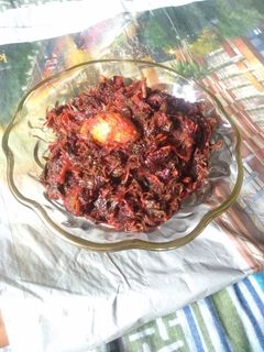 A picture of Lal shak ar amda (red amaranth with hog plum or wild mango).