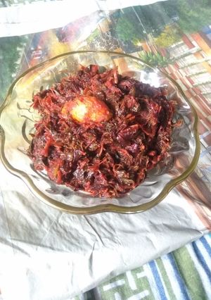 A picture of Lal shak ar amda (red amaranth with hog plum or wild mango).