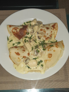 Una foto de Creps de pollo con champiñones