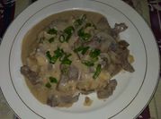A picture of sirloin steak and eggs