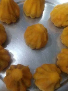 A picture of Dates and coconut modak.
