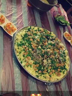 صورة لوصفة منسف اردني على اصوله