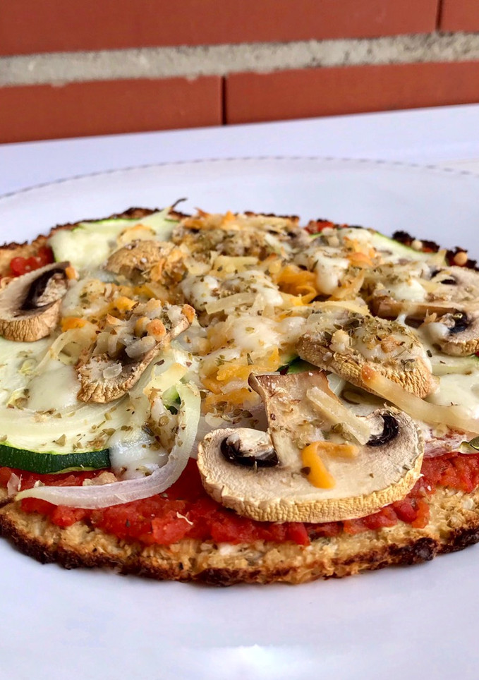 Una foto de Pizza con base de coliflor