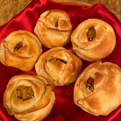 A picture of Rose Shaped Baked Pav Bhaji.