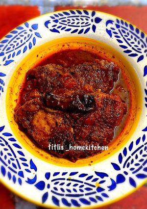 A picture of Lonka Pora Rui(Fish Curry in Roasted Chilli Sauce).