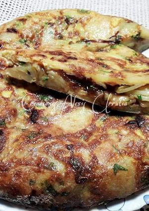 Foto principal de Tortilla cuajada de patatas, ajos, perejil y jengibre