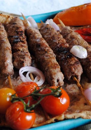 A picture of Persian  kebab kubideh with  rice (Chelow kebab).