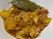 Una foto de migas de bacalao con tomate