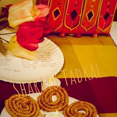 Thalipith Bhajani &Mint Chakali A picture of Thalipith Bhajani &Mint Chakali.
