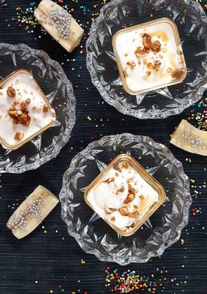 A picture of Peanut butter ice cream with banana caramel cake.