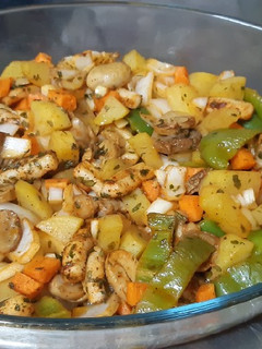 Una foto de Pota al horno con verduras
