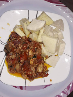 A picture of Boiled yam with fresh fish sauce.
