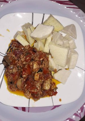 A picture of Boiled yam with fresh fish sauce.