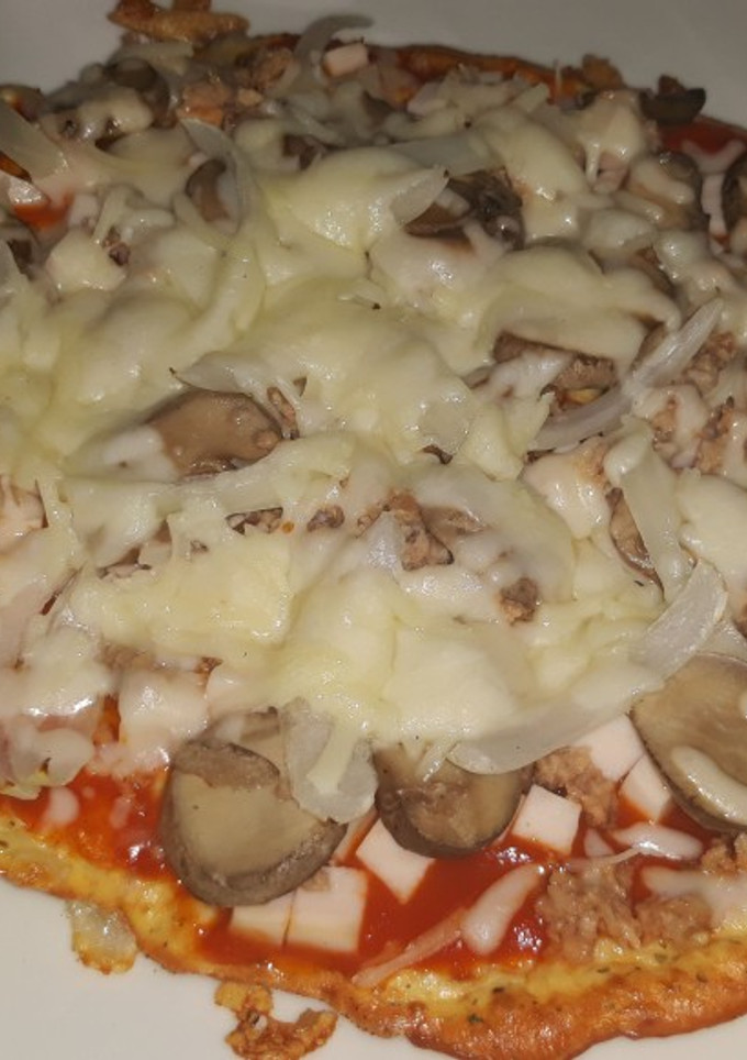 Una foto de Pizza fitness con base de pollo