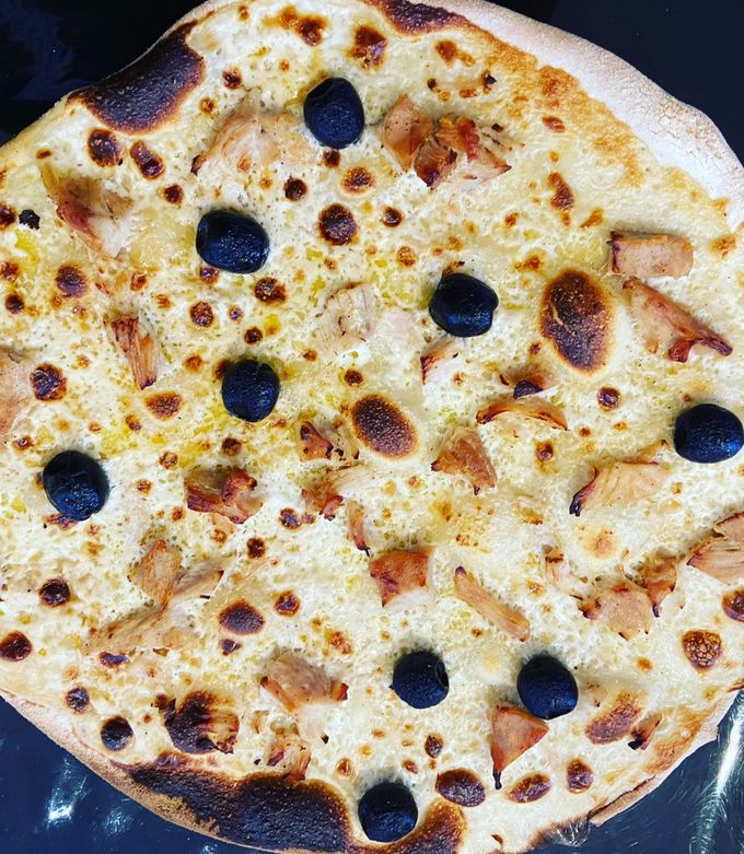 Une photo de Pizza boisée