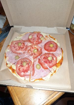 Una foto de Pizzas de tomate 🍅