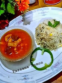 A picture of Fried rice with chicken shashlik.