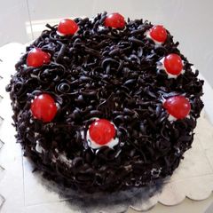 A picture of Black Forest Cake with The Cake Girl.