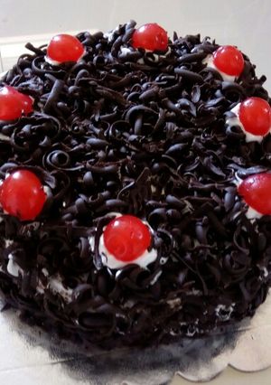 A picture of Black Forest Cake with The Cake Girl.