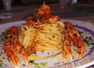 Foto di Fettuccine con Scampi sfumati al Cognac e Pomodorini Freschi