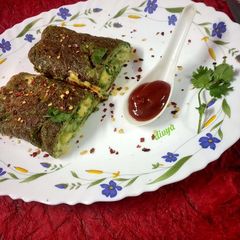 Palak omelette cheese role A picture of Palak omelette cheese role.