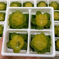 A picture of Pandal Jelly with Stuffed Green Beans.
