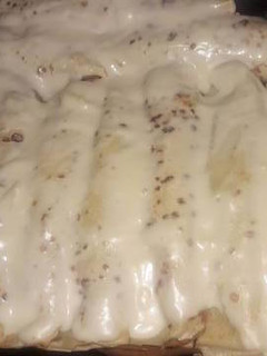 Una foto de • Canelones de pollo con salsa blanca •