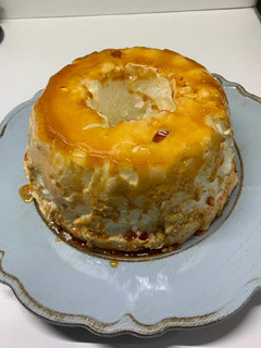 Una foto de Isla flotante con salsa de vainilla y de dulce de leche