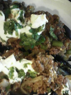 Una foto de Berenjenas rellenas opción carne y vegetariana