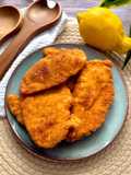 Pechuga empanada de pollo frita