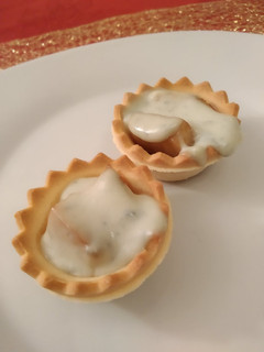 Una foto de Tartaletas de queso azul y pera