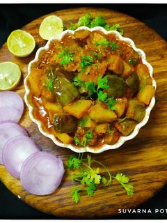वांग बटाटा भाजी (vanga batata bhaji recipe in martahi) रेसिपी चे मुख्य फोटो