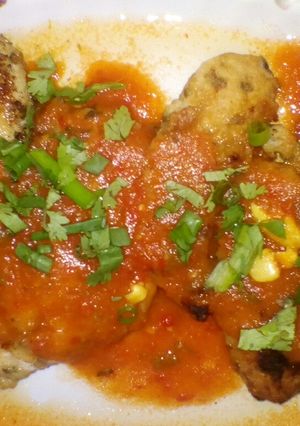 Una foto de Milanesa en salsa de tomate picante