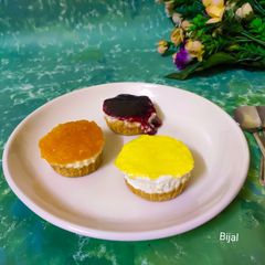 A picture of Cheesecake-pinepple, mango, blueberry.