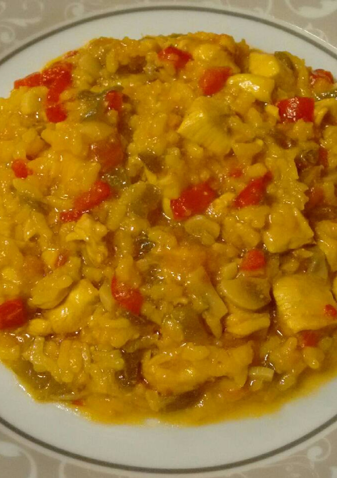 Una foto de Arroz con bacalao y pollo, súper rápido