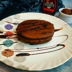 A picture of Chocolate whole wheat pancakes (eggless).