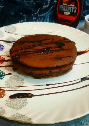 A picture of Chocolate whole wheat pancakes (eggless).