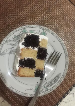 A picture of Vanilla chocolate mint checker board cake.