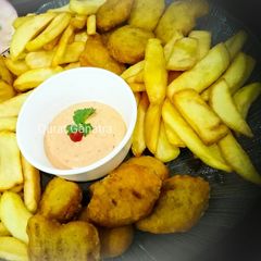 A picture of Nuggets with fries and mayo dip 💜🍟.