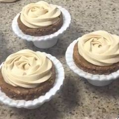 A picture of Espresso walnut cakes with salted caramel cream and chocolate crumble.