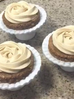 A picture of Espresso walnut cakes with salted caramel cream and chocolate crumble.