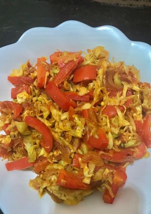 A picture of Red Bell Pepper in Cabbage.