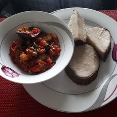 A picture of Aubergine and Snail Sauce paired with Boiled Yam.