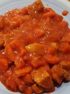 Una foto de Magro con tomate