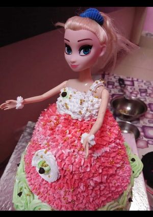 A picture of Barbie doll cake.