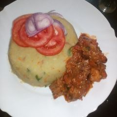 A picture of Mashed potatoes with beef.
